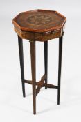 A late 19th century Sheraton style marquetry inlaid satinwood urn stand, the octagonal top decorated