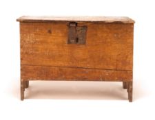A HENRY VII BOARDED OAK COFFER, LATE 15TH CENTURY, with chamfered trefoil shaped ends, 59cm x 84cm x