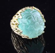 A 1970`s? gold and large carved cabochon emerald dress ring, with rustic setting and foliate