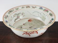 A Chinese famille rose basin, Daoguang period, the centre painted with a crane perched on a rock