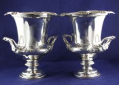 A pair of 19th century Sheffield plate two handled campana shaped wine coolers and liners, with