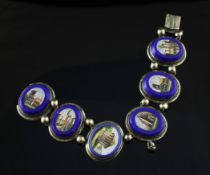 An early 20th century French silver gilt and micro-mosaic bracelet, set with six oval panels