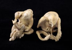 Two Japanese ivory groups, Meiji period, the first a bird of prey clasping a snake in its talons,