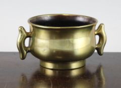 A Chinese bronze censer, Xuande seal mark, 18th century or later, the squat baluster body with