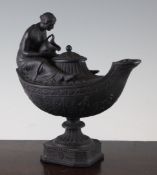 A Wedgwood black basalt Vestal lamp, date code for 1868, modelled with the figure of a seated maiden