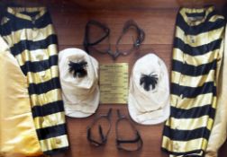 Horse Racing Interest: A framed and glazed pair of racing silks, caps and spurs belonging to Major