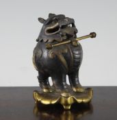 A late 19th / early 20th century gilt and patinated bronze inkwell, modelled as a Japanese lion-dog,