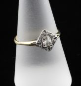 A 1930`s Art Deco gold and diamond dress ring, of lozenge form, set with old and rose cut stones