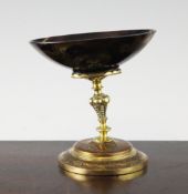 An 18th century engraved brass and oval agate pedestal bowl on stand, 5in.