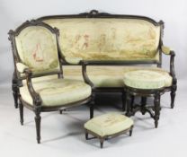 A large late 19th century salon suite, with aubusson tapestry upholstery, including a settee, a pair