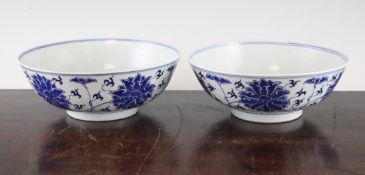 A pair of Chinese blue and white `lotus` bowls, Guangxu mark but later, with lappetted borders, 7.