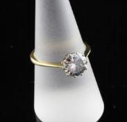 A gold and diamond solitaire ring, the round brilliant cut stone weighing approximately 1.50ct, size