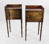 A pair of 19th century mahogany night cupboards, each with a three quarter gallery and single