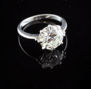 A 1940`s/1950`s platinum and solitaire diamond ring, the transitional cut stone weighing