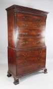 A George III mahogany chest on chest, with blind fret carved decoration, two short and three long