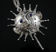 A 1970`s silver and cabochon lapis lazuli set "Sun God" pendant necklace by Michael Allan Bolton,