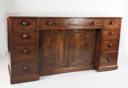 A 19th century mahogany straight front sideboard, in the manner of Gillows with frieze drawer