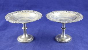 A matched pair of early 20th century Chinese silver pedestal sweetmeat dishes, with pierced