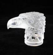 A Lalique frosted and clear glass Tête d`Aigle car mascot, post war, modelled in the form of an