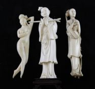 Three Chinese ivory figures, early 20th century, the first a robed figure holding a flute, wood