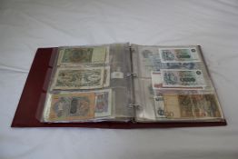 A collection of British and World bank notes, including 1950`s Bank of England £5 note, various Bank