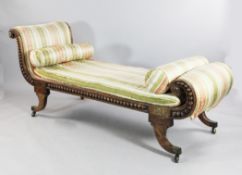 A 19th century simulated rosewood and brass inlaid day bed, with scrolling ends and half bobbin