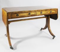 A 19th century mahogany sofa table, with line inlay, fitted two frieze drawers opposing dummy