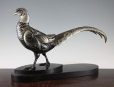 A 1930`s French patinated metal model of a pheasant, on stepped oval black marble base, 21in.