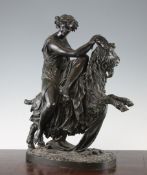 After Clodion. A large 19th century bronze figure group of a bacchante riding a goat, on a