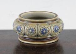 A Martin Brothers Stoneware salt cellar, c.1879, of compressed globular form decorated with a band