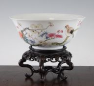 A Chinese famille rose bowl, Republic period, finely painted with bamboo, rock work, lingzhi fungus,