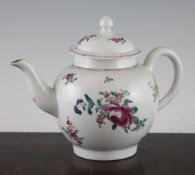 A Lowestoft large globular teapot and cover, c.1780, painted with polychrome floral sprays with iron