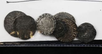 Seven British medieval to Renaissance silver hammered coins, including Henry II and Edward III