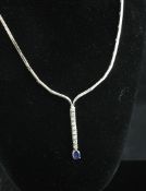 An Italian 18ct white gold, sapphire and diamond drop necklace, with articulated links and drop