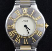 A 1990`s Must de Cartier 21 bi-metallic quartz wrist watch, with Roman chapter ring and cabochon