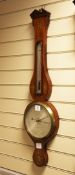 A Regency inlaid mahogany wheel barometer, with silvered thermometer and dial, signed Louis Ganna,