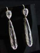 A pair of gold and kunzite drop earrings, each set with pear and elongated pear cut stones, 2.25in.