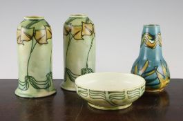 Four items of Minton Secessionist pottery, c.1900-10, comprising a pair of bell shaped vases with