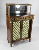 A Regency rosewood and gilt brass mounted chiffonier, the superstructure with mirrored back over two