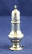 A George III silver baluster pepperette, with spiral finial, Robert Peaston, London, 1775, 5in, 2.