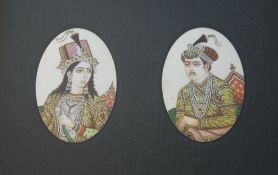 A pair of late 19th century Indian oval ivory painted portrait miniatures, framed and glazed, 9.