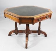 A 19th century reformed Gothic octagonal top walnut centre table, with green inset skiver over two