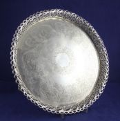 A mid 19th century Portuguese silver salver, with pierced foliate gallery and engraved foliate