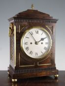 A Regency rosewood bracket clock, with brass inset case, silvered Roman dial and unsigned double