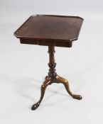 An 18th century and later mahogany adjustable tripod table, the octagonal shaped top and single
