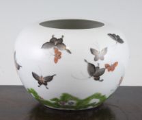 A Chinese famille rose globular jar, painted with butterflies amid flowers, 5.4in. (13.8cm)