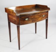 A 19th century mahogany gentleman`s wash stand, with three quarter gallery back, single frieze