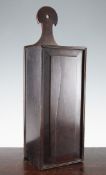 An 18th century yew wood rectangular candle box, with a sliding fielded panel, 21.5in.