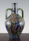 A Della Robbia pottery twin handled vase, c.1900, painted by Charles Collis with stylised