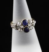 A 19th century gold and silver, sapphire and diamond cluster ring, set with oval cut sapphires and